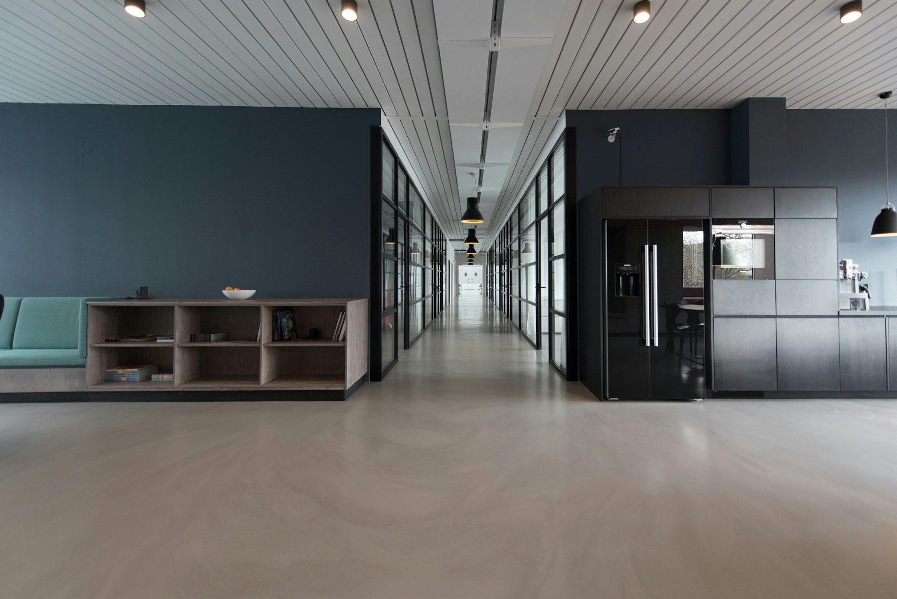 Professional office interior with desks and large windows